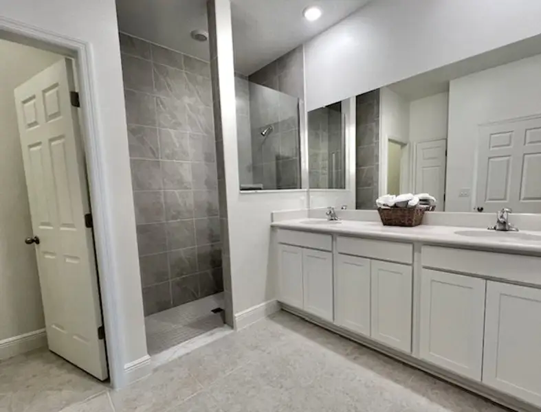 Furnished interior view inside a new home in Lakes At St Sebastian, Micco (Image 27).