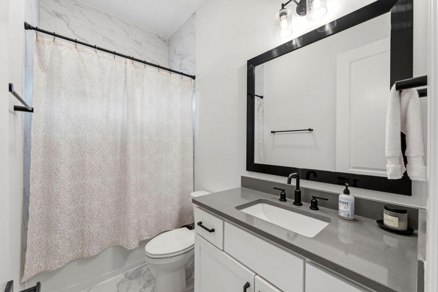 Furnished interior view inside a new home in , Conroe (Image 34).