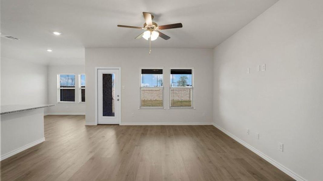 Spacious interior featuring wood-finish flooring and a neutral color palette