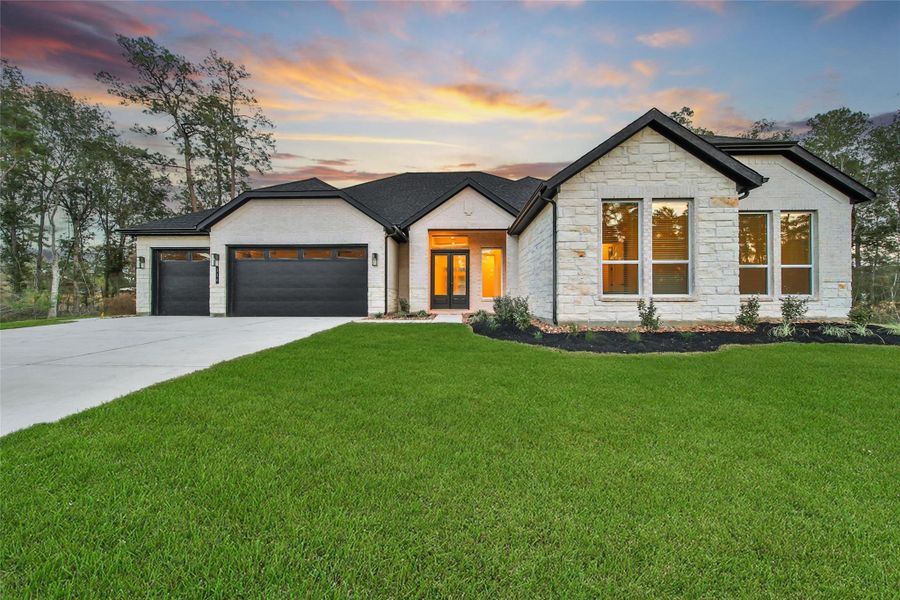 Front exterior of a new home in Butlers Bend Estates, Pinehurst, TX, highlighting curb appeal (Image 2).