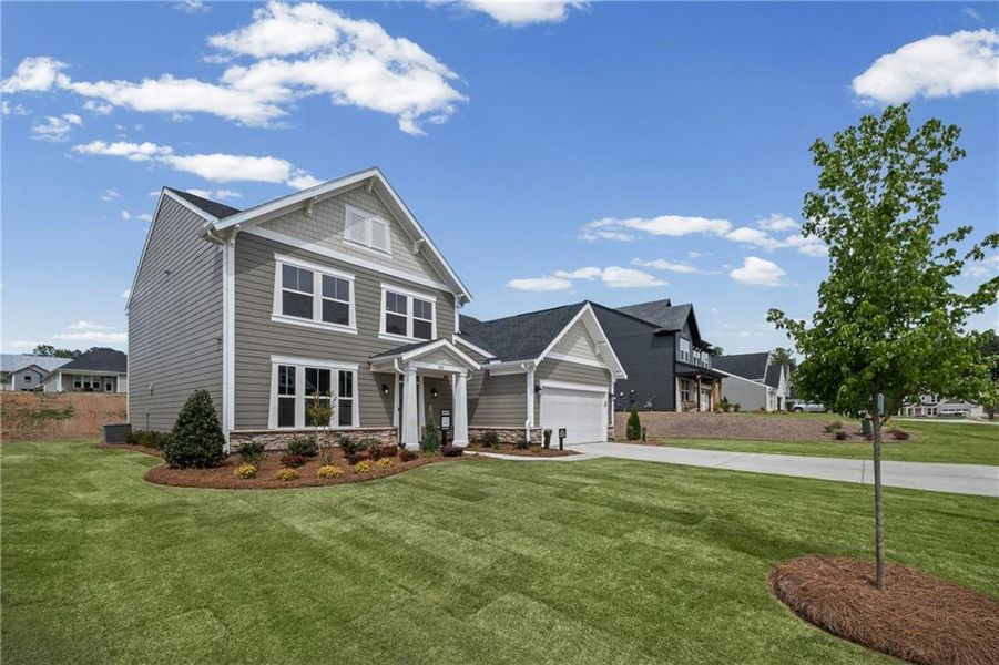 Front exterior of a new home in Pickens Bluff, Hiram, GA, highlighting curb appeal (Image 26).