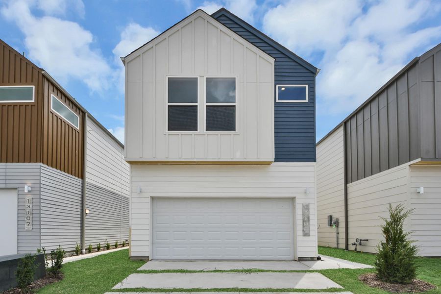 Front exterior of a new home in Alicante, Houston, TX, highlighting curb appeal (Image 22).