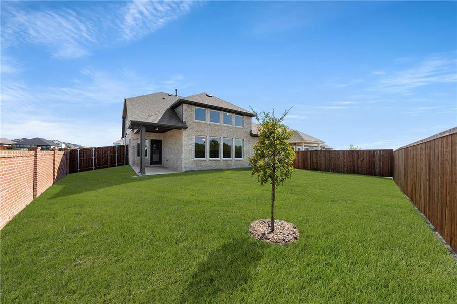 Front exterior of a new home in Creekside, Royse City, TX, highlighting curb appeal (Image 2). Front exterior of a new home in Creekside, Royse City, TX, highlighting curb appeal (Image 2).