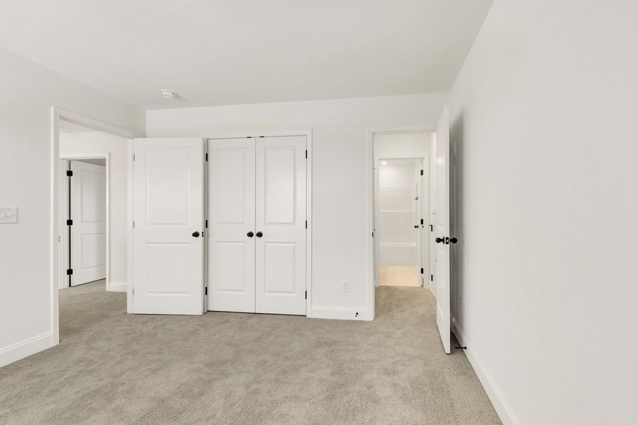 Representative unfurnished interior of a home built from the Titusville II by Regent Homes in Marlon's Creek, Spring Hill (Image 37).
