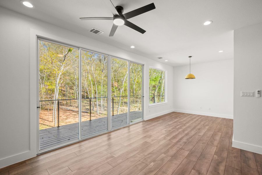 Spare room with recessed lighting, a ceiling fan, and light wood finished floors