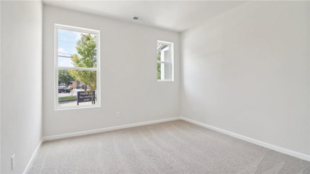 Spacious, unfurnished interior of a new home in Townes at Asbury, Hapeville (Image 21).