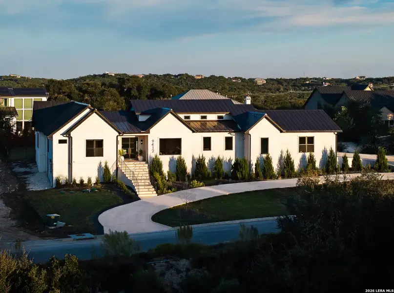 Front exterior of a new home in , San Antonio, TX, highlighting curb appeal (Image 32).