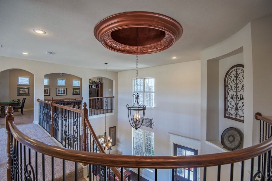 Representative furnished interior of a home built from the Kennedy by Windmiller Custom Homes in The Highlands, Northlake (Image 4).