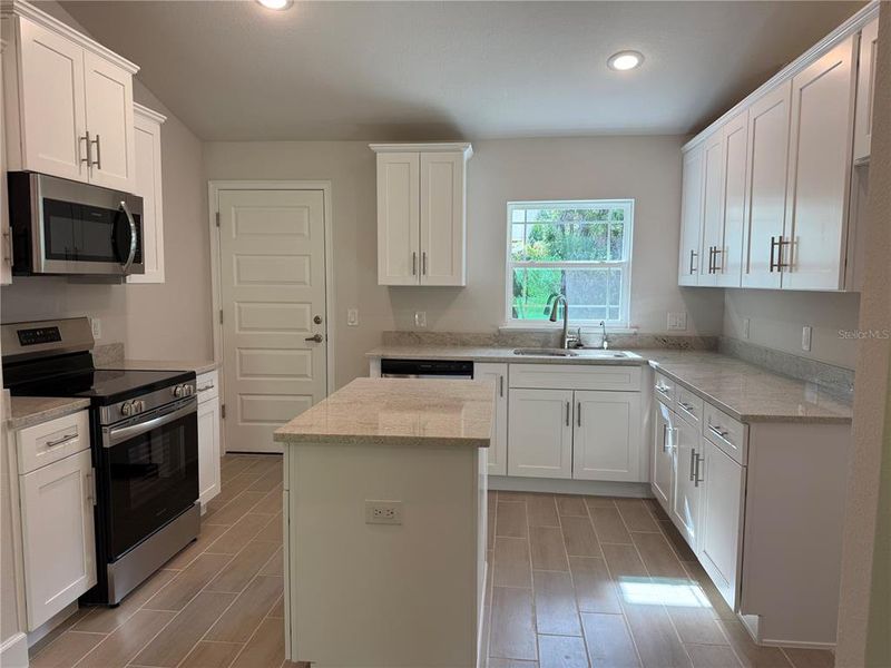 Furnished interior view inside a new home in North Port, North Port (Image 3).