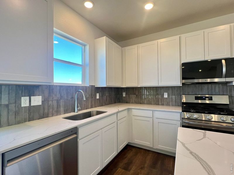Furnished interior view inside a new home in Union Colony West, Greeley (Image 6).