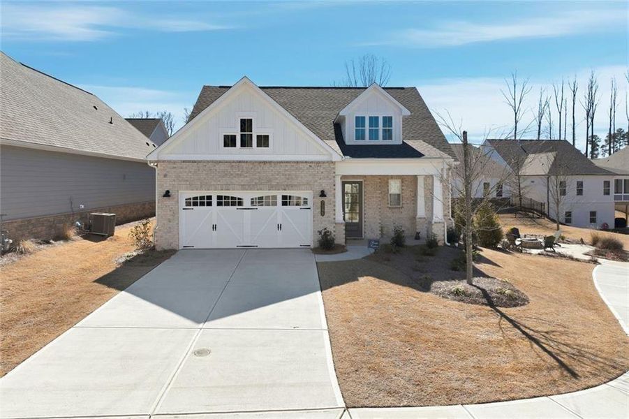 Front exterior of a new home in , Cumming, GA, highlighting curb appeal (Image 29). Front exterior of a new home in , Cumming, GA, highlighting curb appeal (Image 29).