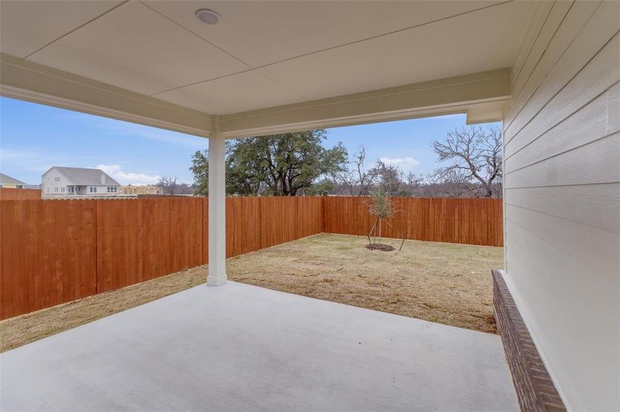 Exterior details and patio area of a home in Covenant Park, Springtown (Image 20).