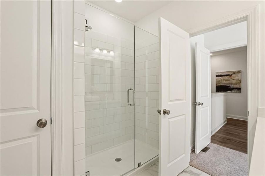 Larger shower and linen closet for extra storage