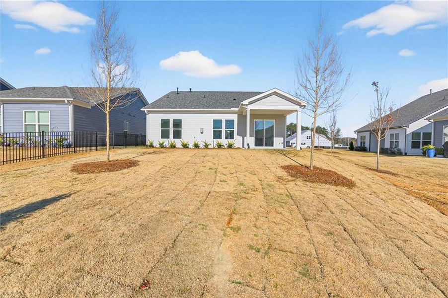 Exterior details and patio area of a home in The Reserve at Bells Ferry, Kennesaw (Image 22).
