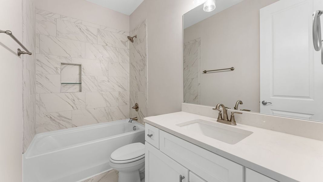 Representative furnished interior of a home built from the The Islamorada by D.R. Horton in WindMark Beach, Port Saint Joe (Image 31).