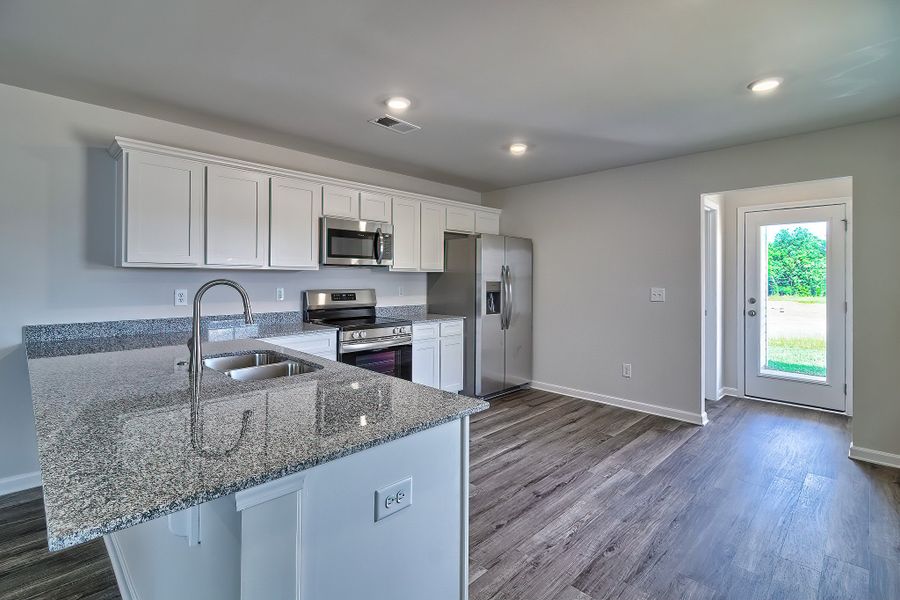 Furnished interior view inside a new home in Canary Woods, Hopkins (Image 5).