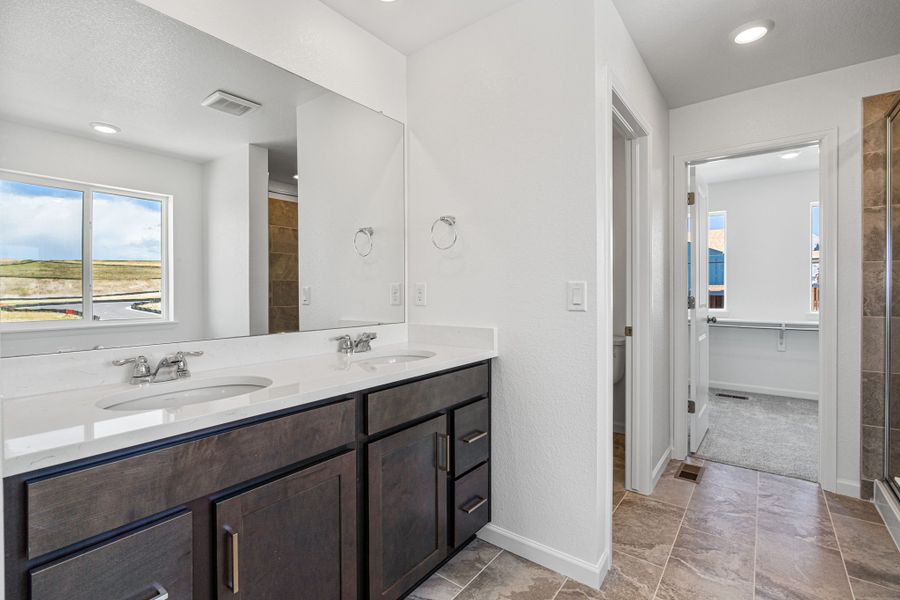Representative furnished interior of a home built from the Eagle by Taylor Morrison in The Town Collection at Independence, Elizabeth (Image 23).