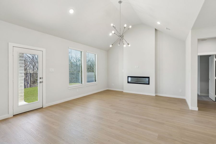 Living Room in the Masters home plan by Trophy Signature Homes – REPRESENTATIVE PHOTO