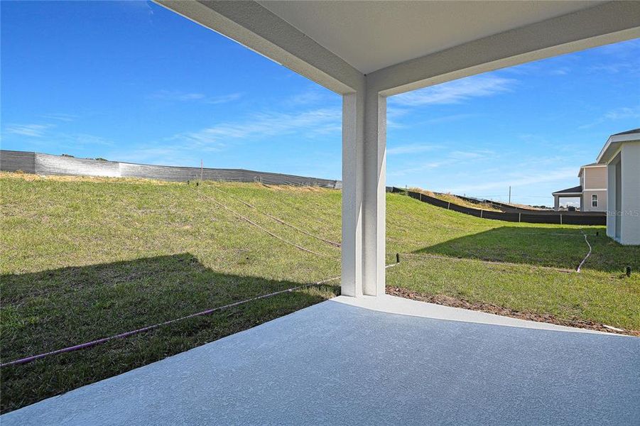 Exterior details and patio area of a home in Seasons at Bella Vista, Dundee (Image 3). Exterior details and patio area of a home in Seasons at Bella Vista, Dundee (Image 3).