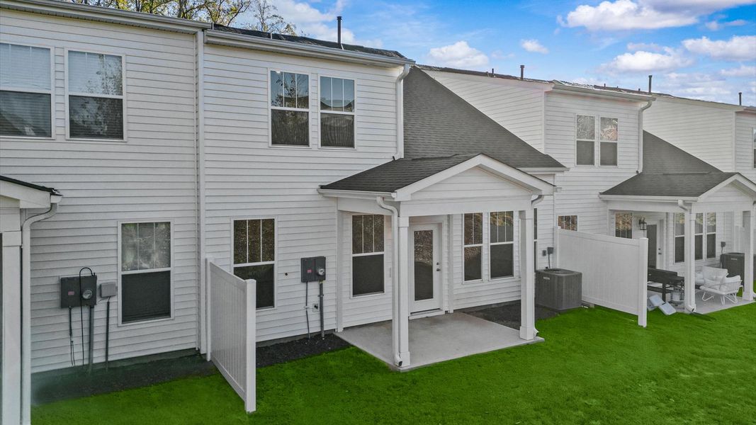 Exterior details and patio area of a home in Camden Cottages, Greenville (Image 3).