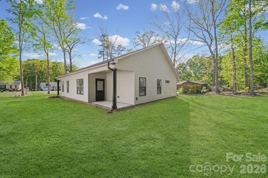 Exterior details and patio area of a home in , Albemarle (Image 3). Exterior details and patio area of a home in , Albemarle (Image 3).