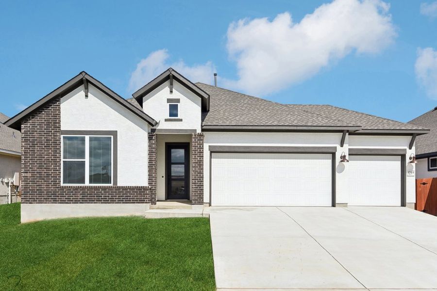 Representative exterior photo of a completed home built from the The Paseo by David Weekley Homes in Meyer Ranch – Legacy Series, New Braunfels, TX (Image 2). Representative exterior photo of a completed home built from the The Paseo by David Weekley Homes in Meyer Ranch – Legacy Series, New Braunfels, TX (Image 2).