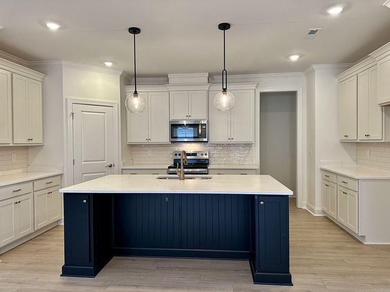 7514 Shoal Mill Point, Kitchen with Island
