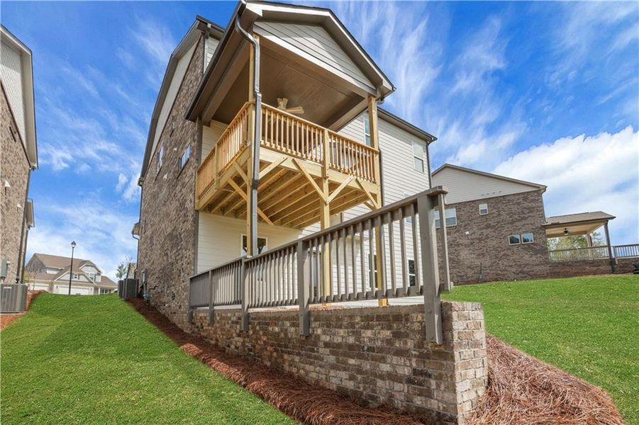 Exterior details and patio area of a home in Cambridge, Flowery Branch (Image 21).