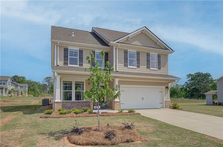 Front exterior of a new home in Cooper Park, McDonough, GA, highlighting curb appeal (Image 15).