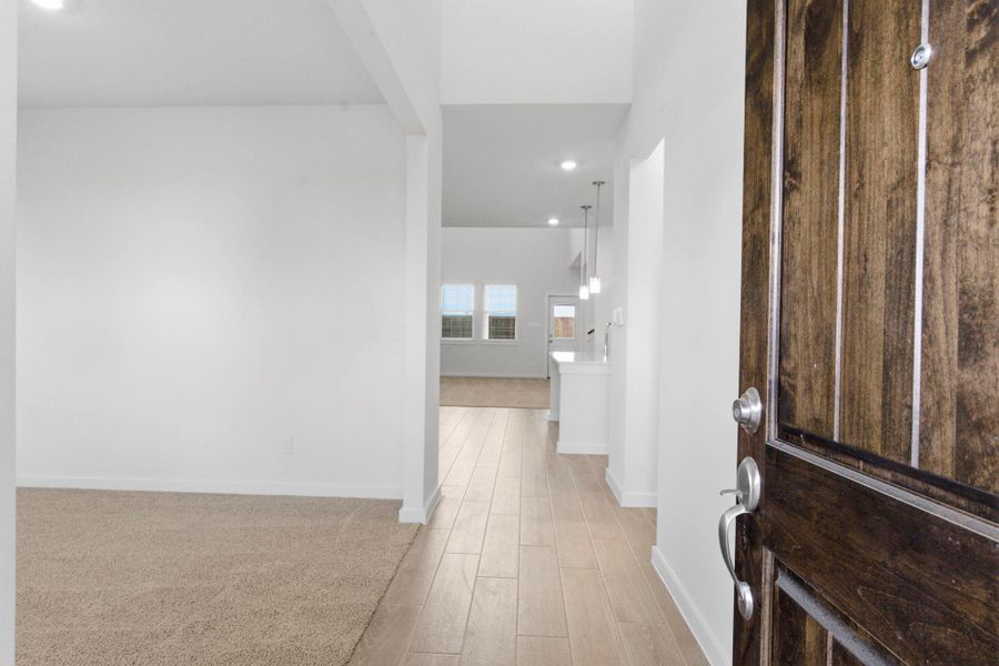 Spacious, unfurnished interior of a new home in , Iowa Colony (Image 24).