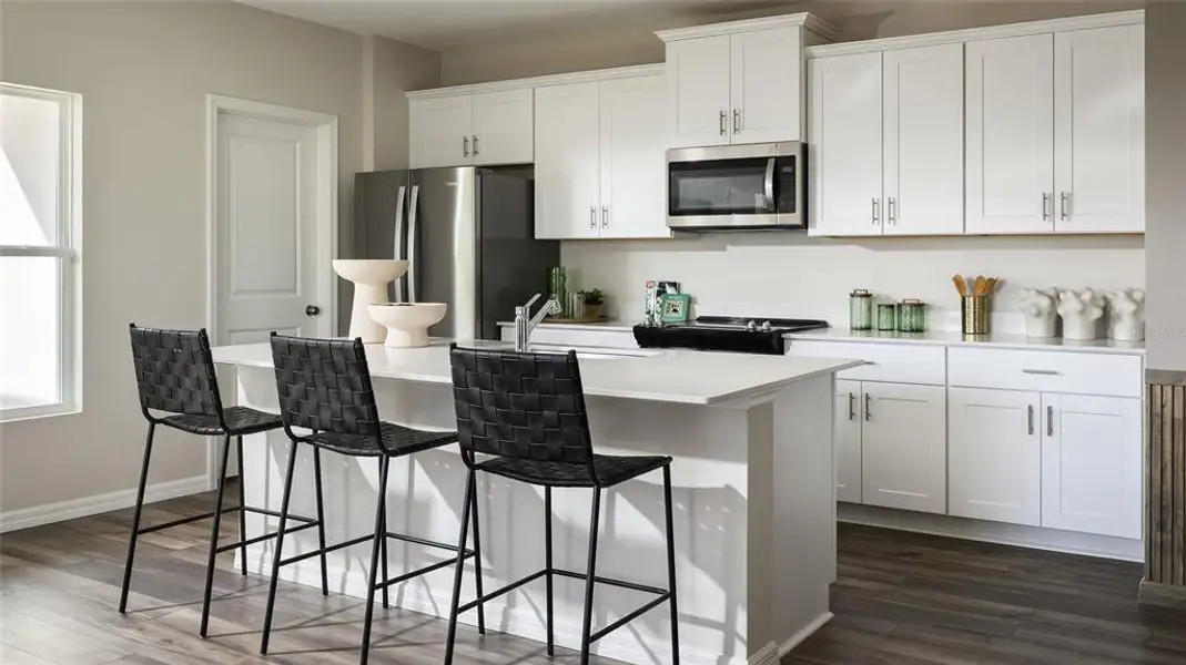 Furnished interior view inside a new home in Pasadena Ridge, Dade City (Image 3).