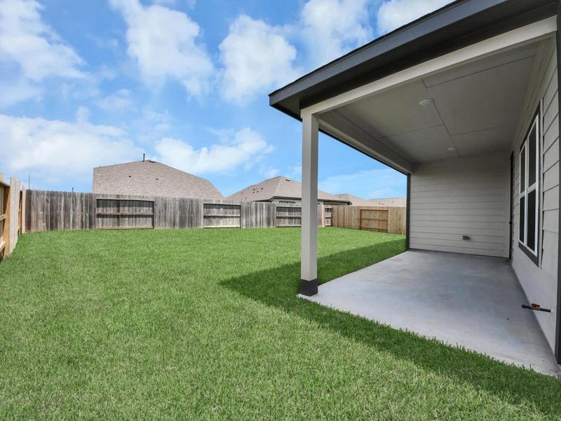 Exterior details and patio area of a home in Sunterra, Katy (Image 3). Exterior details and patio area of a home in Sunterra, Katy (Image 3).