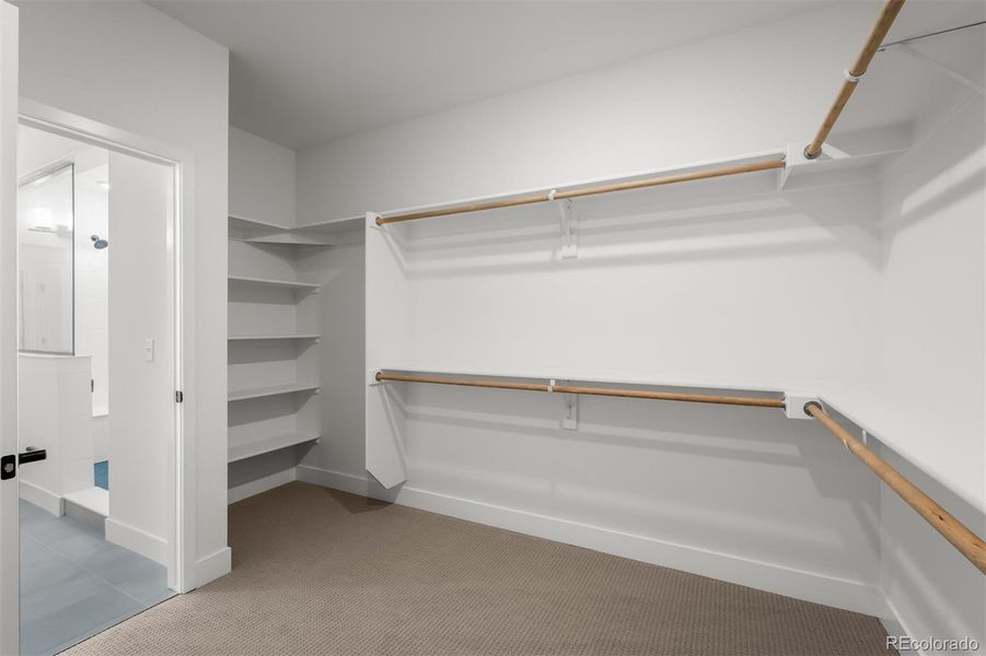 Spacious, unfurnished interior of a new home in Revel Crossing at Wolf Ranch - The Panorama Collection, Colorado Springs (Image 23).