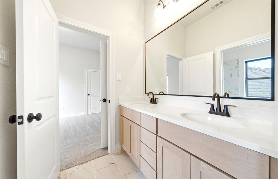 Furnished interior view inside a new home in Bridgeland 50', Cypress (Image 7). Furnished interior view inside a new home in Bridgeland 50', Cypress (Image 7).