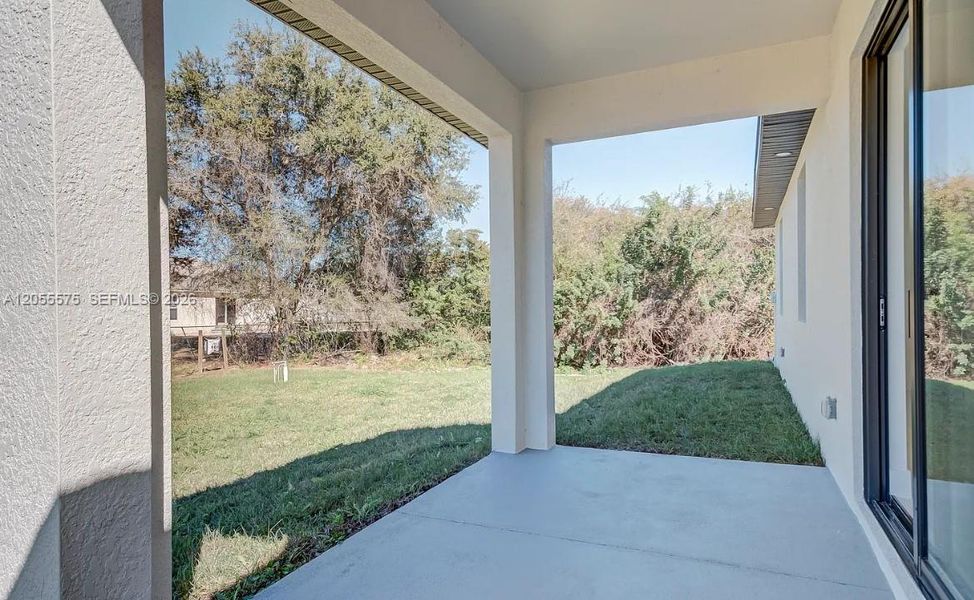 Exterior details and patio area of a home in , Lehigh Acres (Image 3).