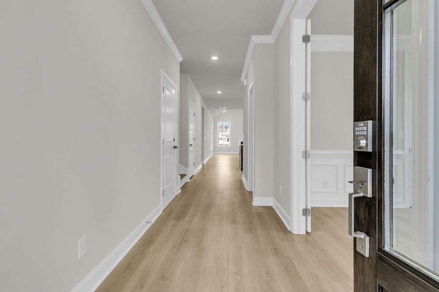 Spacious, unfurnished interior of a new home in Tidewater at Lakes of Cane Bay, Summerville (Image 21).