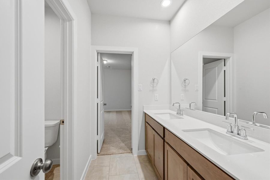 Furnished interior view inside a new home in Canterra Creek  60', Iowa Colony (Image 13).