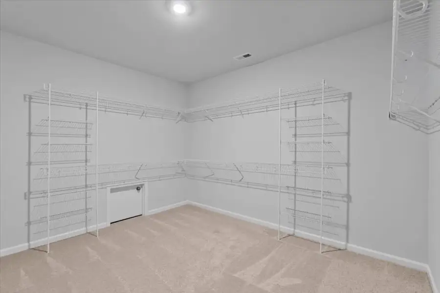 Spacious, unfurnished interior of a new home in Lilah Grove, Summerfield (Image 42).