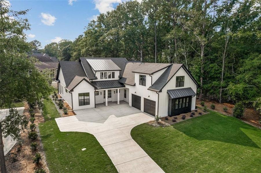 Front exterior of a new home in , Eatonton, GA, highlighting curb appeal (Image 2). Front exterior of a new home in , Eatonton, GA, highlighting curb appeal (Image 2).