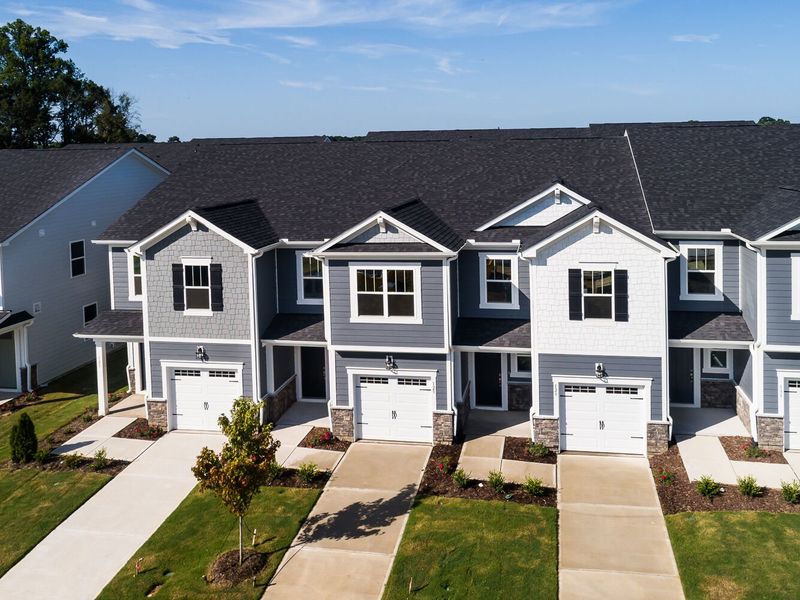 Front exterior of a new home in Vaughan Farms, Angier, NC, highlighting curb appeal (Image 1). Front exterior of a new home in Vaughan Farms, Angier, NC, highlighting curb appeal (Image 1).