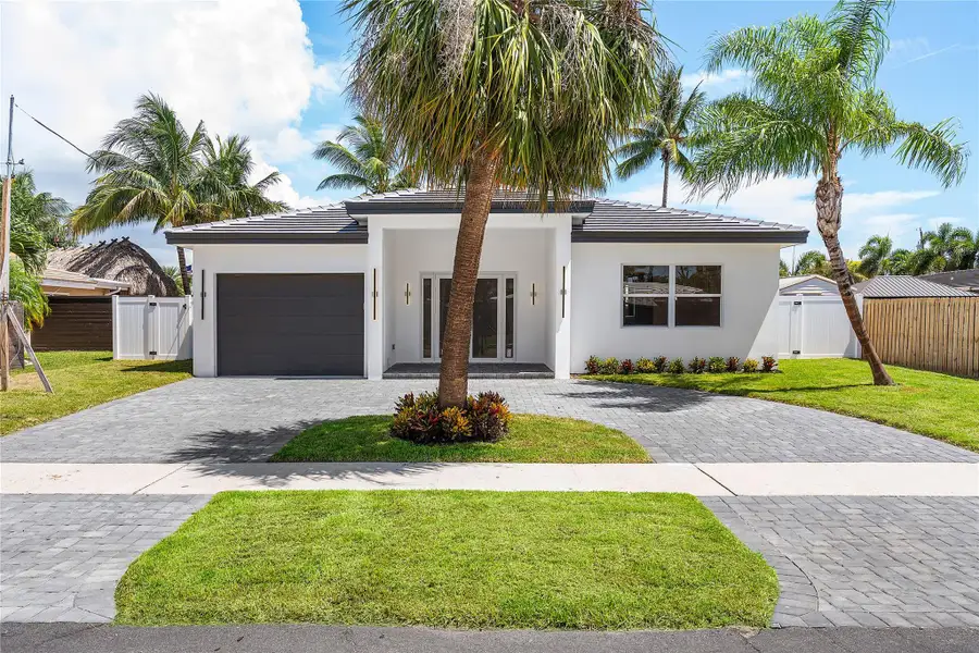 Front exterior of a new home in , Pompano Beach, FL, highlighting curb appeal (Image 1).
