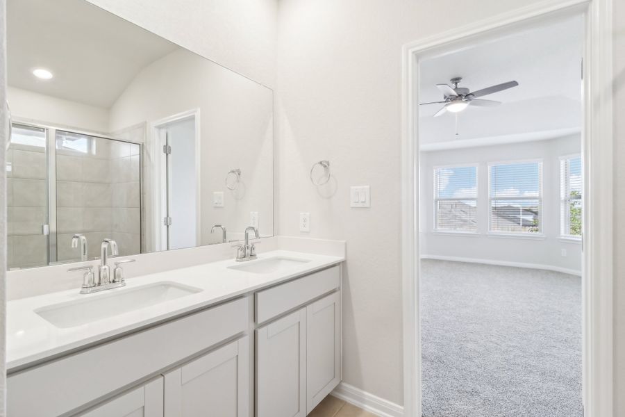 Primary suite bathroom in the Briscoe floorplan at a Meritage Homes community.