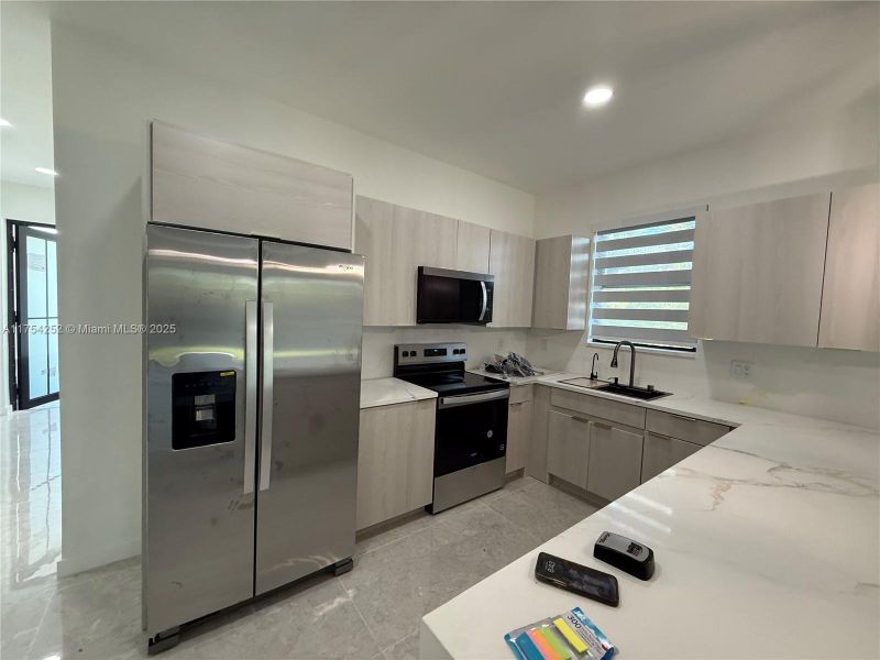 Furnished interior view inside a new home in , Punta Gorda (Image 2).