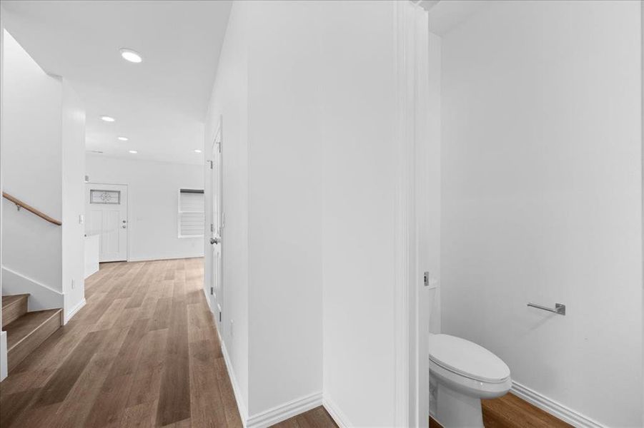 Convenient half bath with modern fixtures and clean, bright finishes—perfect for guests.
