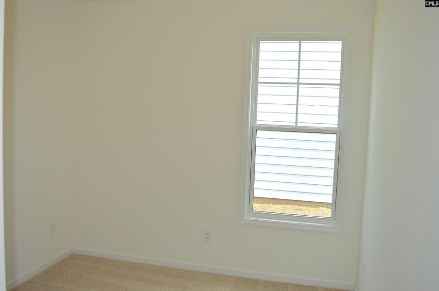 Spacious, unfurnished interior of a new home in Bickley Station, Irmo (Image 18).