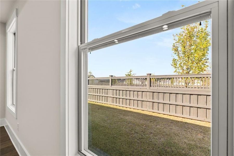 Exterior details and patio area of a home in Soleil Summit Chase, Snellville (Image 32).