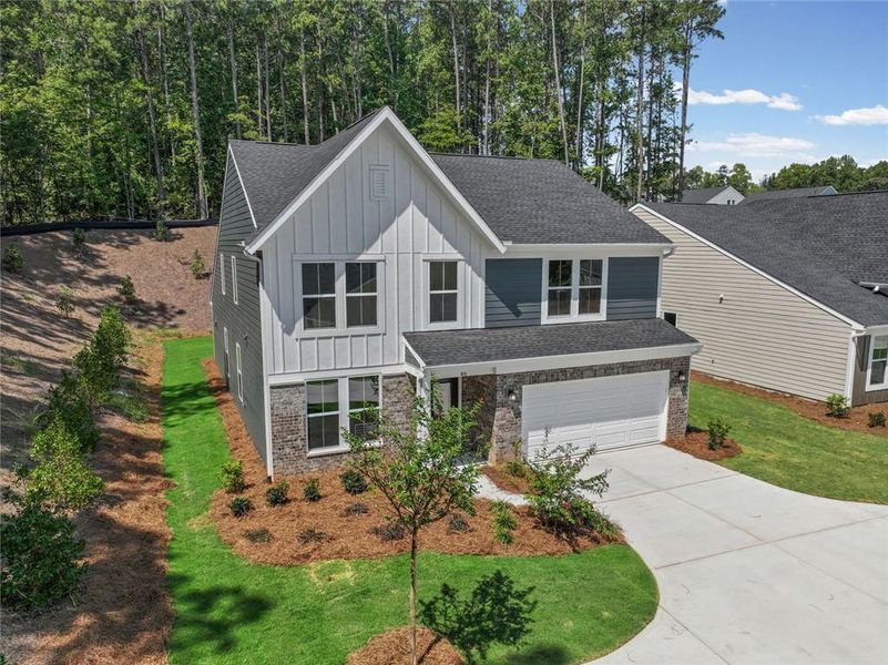 Front exterior of a new home in Easton Park, Dallas, GA, highlighting curb appeal (Image 20). Front exterior of a new home in Easton Park, Dallas, GA, highlighting curb appeal (Image 20).