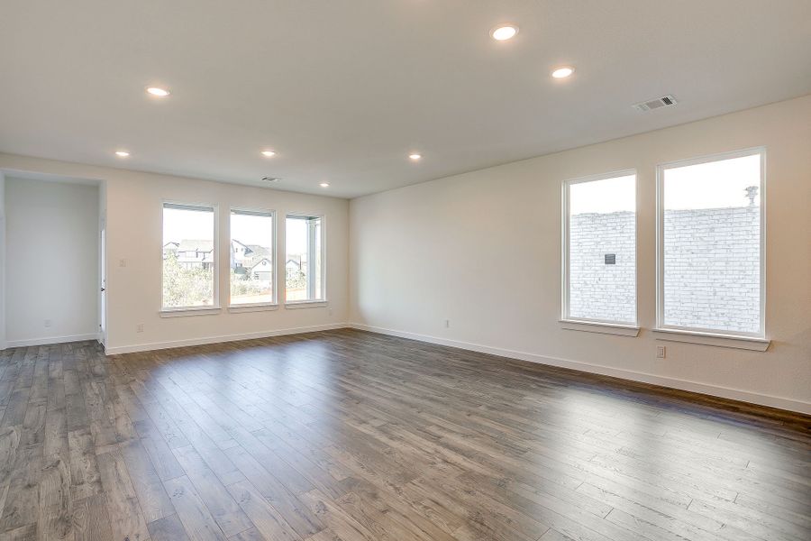 Representative unfurnished interior of a home built from the Palmer by Graham Hart Home Builder in Bear Ridge, Burleson (Image 26).