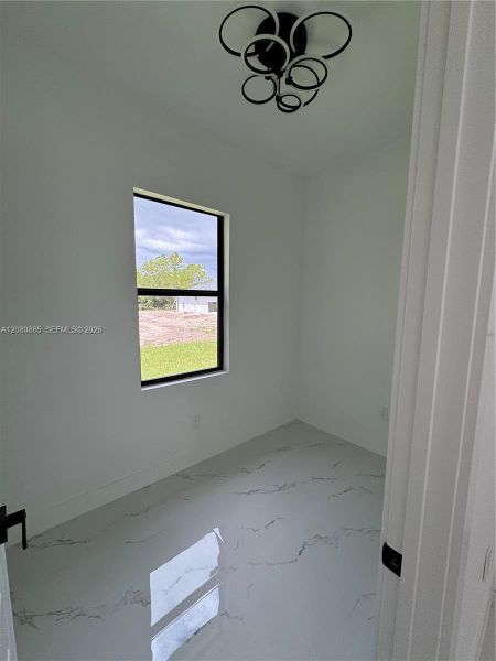 Spacious, unfurnished interior of a new home in , Lehigh Acres (Image 13).