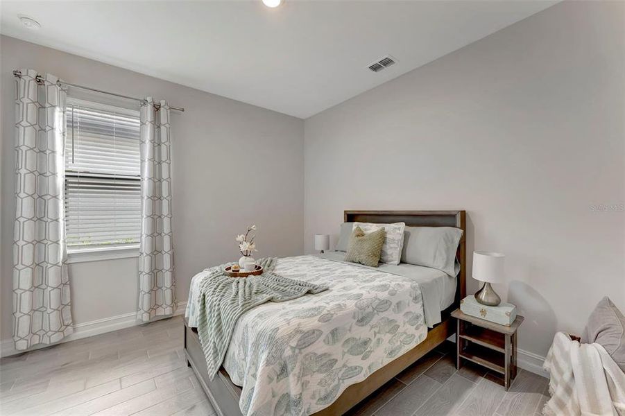 Furnished interior view inside a new home in , Nokomis (Image 40).